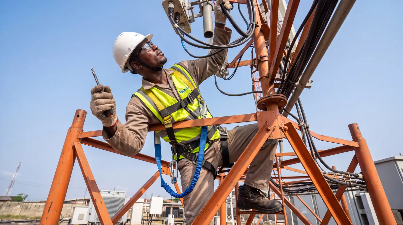 Nigeocom project team coordinating cable installation